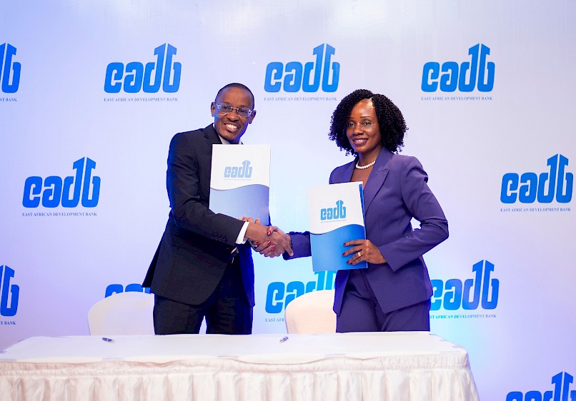 EADB Ag. Director General Benard P. Mono poses for a photo with the Tanzania Investment Bank (TIB) Ag. Managing Director, Lilian M. Mbassy after the signing of a Tzs 30 billion loan agreement